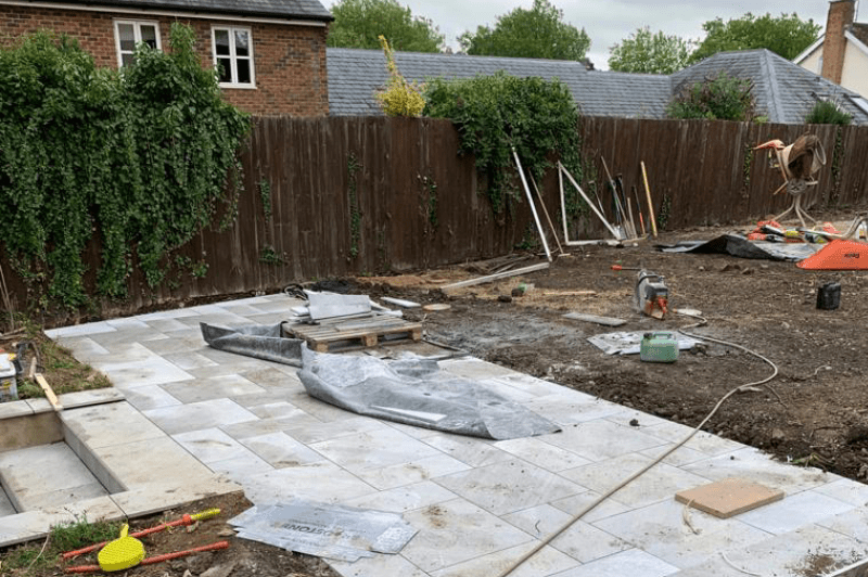 Garden clearance installation of cotswold paving landscaping patio design 4