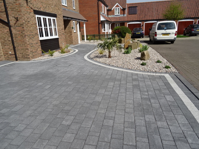 Driveway intallation with paving and cotswold stone