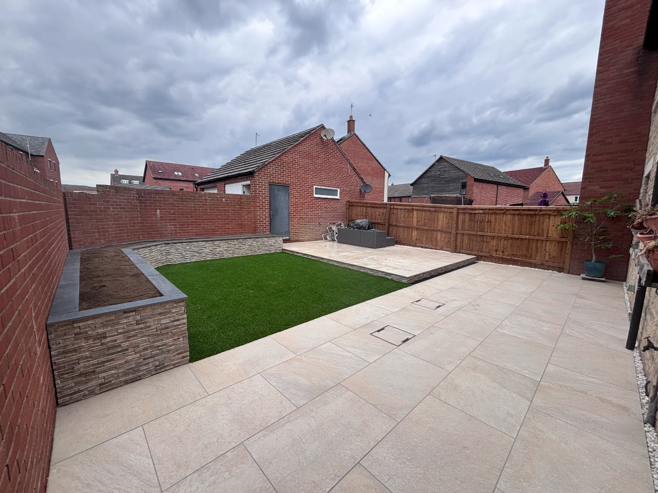Garden clearance installation of cotswold paving landscaping patio design 2